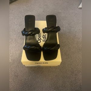 Black faux leather heels